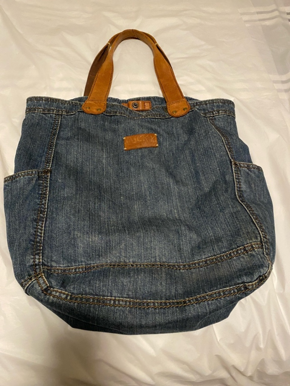 Lucky Brand Blue Denim Duffel Bag with Tan Leather Handles